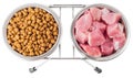 Meat and dry food for pets in metal bowls Royalty Free Stock Photo