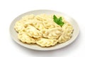 Meat dumplings - russian pelmeni, ravioli with meat on a white background,