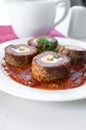 Meat and egg rolls in tomato sauce Royalty Free Stock Photo