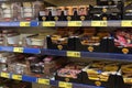 Meat and fish semi-finished products on supermarket shelves