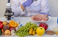 Meat and Food Quality Control Laboratory Testing with a Magnifying Glass Royalty Free Stock Photo