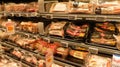 Meat in a fridge shelf at a swedish supermarket : chicken, sausages, beef, salamiÃ¢â¬Â¦ Royalty Free Stock Photo