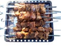 Meat fried over the coals on the skewers. Royalty Free Stock Photo