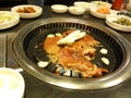 Korean Barbecue With Various Side Dishes Royalty Free Stock Photo