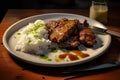 meat with gravy and rice on white plate Royalty Free Stock Photo