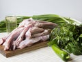 Meat and green vegetables for cooking chakapuli, a Georgian trad