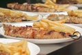 Meat grilled on skewers with fries Greek cuisine. souvlaki
