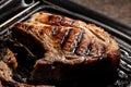 Meat during grilling. grilled pork chop on grill. Food recipe background. Close up