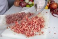 Chef is chopping the raw beef on cutting board with knife to cook in the kitchen, minced beef. Kebab restaurant, kebab preparation