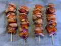 Meat kebabs on wooden skewers aerial Royalty Free Stock Photo