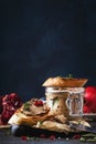 Meat liver pate on toasted bread with fruit seeds and spice herb, brown kitchen table, copy space, selective focus Royalty Free Stock Photo