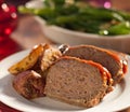 Meat loaf with roasted herb potatoes Royalty Free Stock Photo