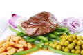 Meat medalion on beans Royalty Free Stock Photo