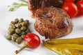 Meat medallion with cherry tomatoes Royalty Free Stock Photo