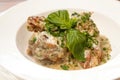 Meat and mushrooms with white sauce. European cuisine