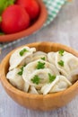 Meat pelmeni with butter