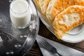 Meat pies with milk. Lunch Royalty Free Stock Photo