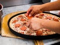 Meat pizza being assembled Royalty Free Stock Photo