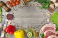 Meat on a plate tomatoes, garlic, onions, bell peppers, hot , wooden table. Knife napkin greens, beets. Beautiful Royalty Free Stock Photo