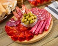 Meat platter on wooden plate