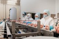 Automated production line with packaging and cutting of meat in modern food factory.Meat processing equipment. Royalty Free Stock Photo