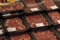 Meat products prepared for sale at the butcher counter. Royalty Free Stock Photo