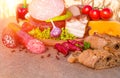 Meat products.Smoked ham,sausage,bacon,vegetables Royalty Free Stock Photo