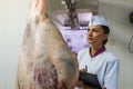 Meat quality control in butchery. Royalty Free Stock Photo