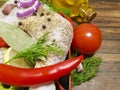 Meat raw chicken leg still life, greens, red pepper rustic uncooked , dish table tomato, lemon garlic, pomegranate nutrition Royalty Free Stock Photo