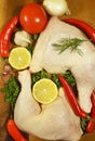 Meat raw chicken leg garlic greens table rosemary dish, red chili pepper, nutrition tomato Royalty Free Stock Photo