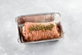 Meat roll stuffed with mushrooms in a baking dish, close-up Royalty Free Stock Photo