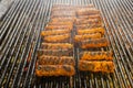 Meat rolls mititei, mici on the grill which is a traditional Balcanic