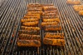 Meat rolls mititei, mici on the grill which is a traditional Balcanic