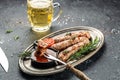 meat sausages with glass of beer. Traditional Oktoberfest menu. Food recipe background. Close up