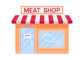 Meat shop building exterior, raw meat food in store. Trade in grocery store. Inscription on facade of house. Small shop