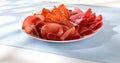 meat slices on a plate. traditional sausage. salchichon, chorizo and prosciutto Royalty Free Stock Photo