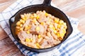 Meat stew with beans and corn