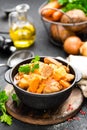 Meat stew with vegetables. Braised meat with cabbage, carrot and potato Royalty Free Stock Photo