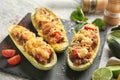 Meat stuffed zucchini boats on slate plate, closeup Royalty Free Stock Photo