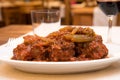 Coda alla Vaccinara meat tail dish specialty from lazio region and Roma area called coda alla vaccinara Royalty Free Stock Photo