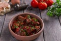Meat in tomato sauce beef roast in a clay bowl Royalty Free Stock Photo