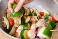 Meat and vegetable kabobs in a bowl