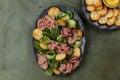 Meat and vegetable salad with roast beef, garlic toast bread