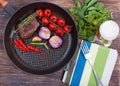 Meat and vegetables in frying pan Royalty Free Stock Photo