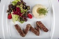 Meatball balls from traditional Turkish cuisine dishes, grilled meatballs, Turkish izgara kofte, a nice presentation