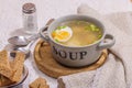 Meatball soup with boiled egg, ditalini pasta, vegetables and fresh herbs. Healthy chicken broth Royalty Free Stock Photo