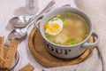 Meatball soup with boiled egg, ditalini pasta, vegetables and fresh herbs. Healthy chicken broth Royalty Free Stock Photo