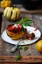 Meatball-stuffed squash with tomato sauce.selective focus