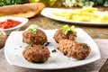 Meatballs with garlic, parsley and onion