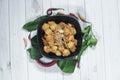 Meatballs with herbs, spices and vegetables with white wood background, top view Royalty Free Stock Photo